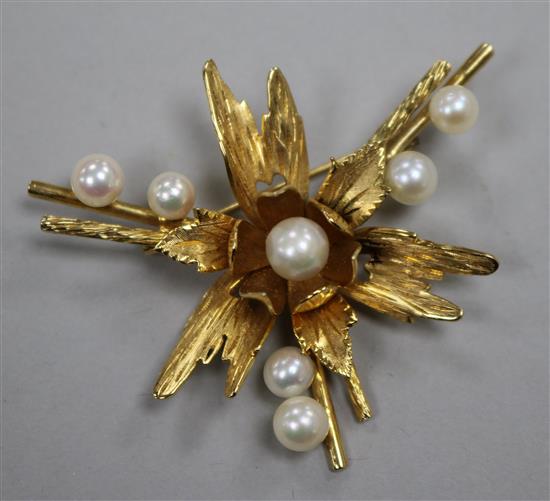A 9ct gold and pearl foliate brooch of modernist design, 53mm.